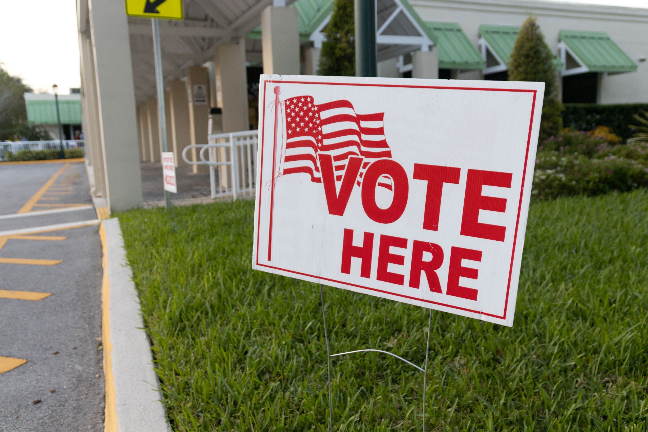 A vote here sign at a polling place on election day